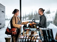 Woman paying in reception